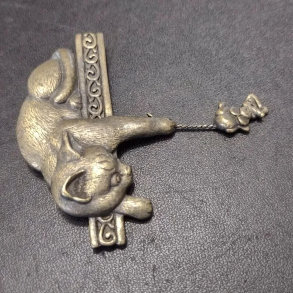 Jonette Jewelry dangling adorable holding